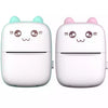 Two small electronic devices with cute face designs on a white background