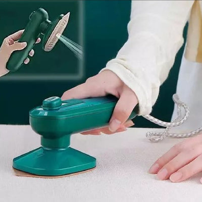 Person using a green handheld sander on a white surface with a close-up inset showing the tool's head.